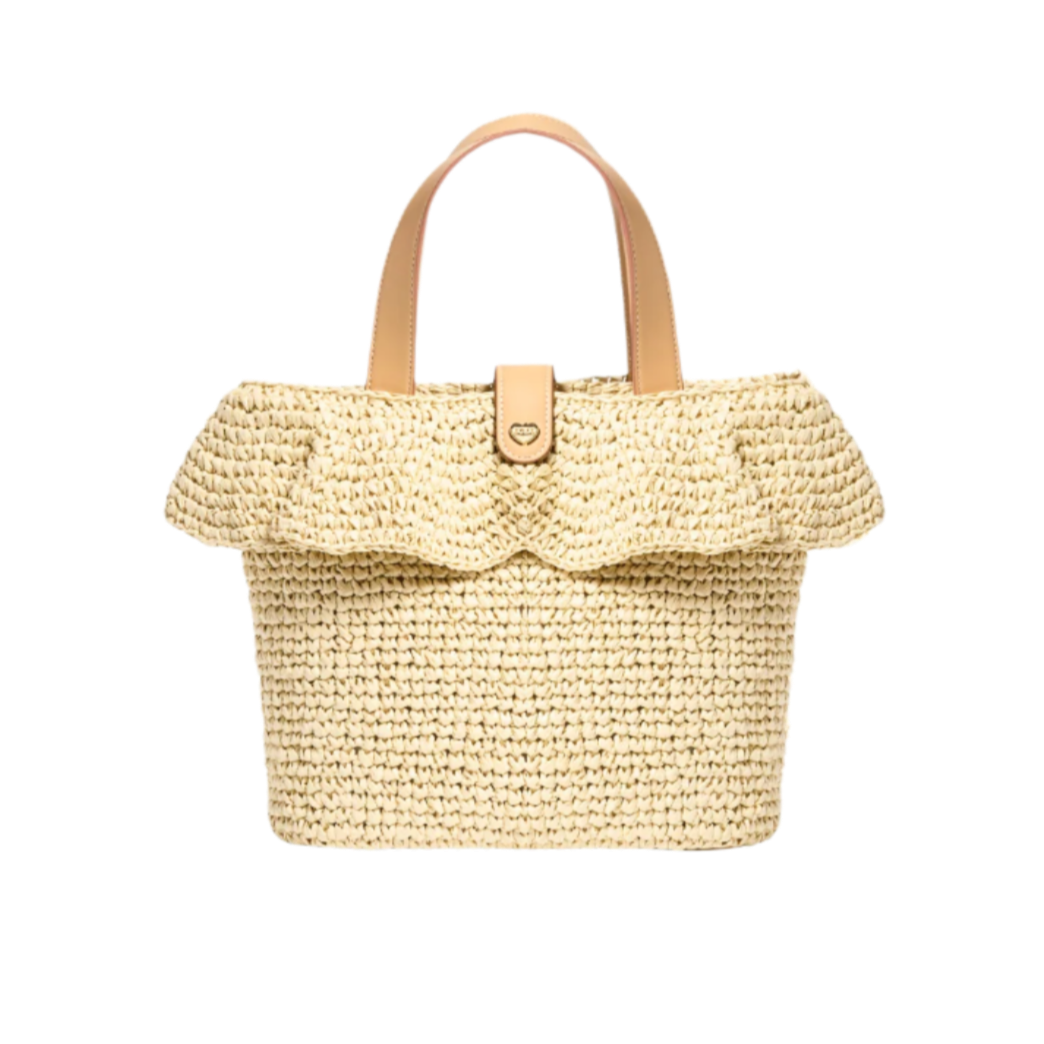 Woven straw handbag with a ruffled top on a white background
